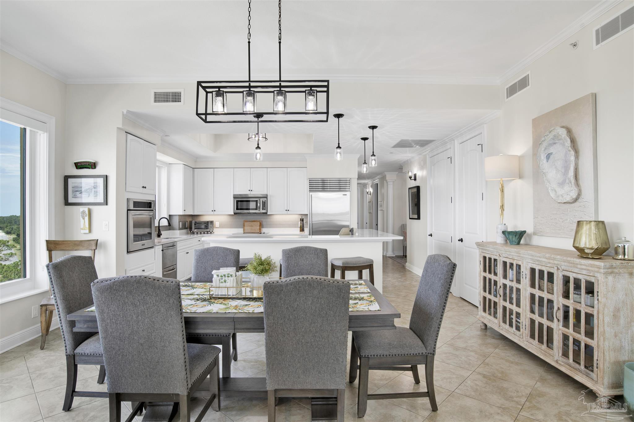 14500 River Road, Unit 507 Pensacola, FL 32507 - Photo 10 of 56 a view of a dining room with furniture