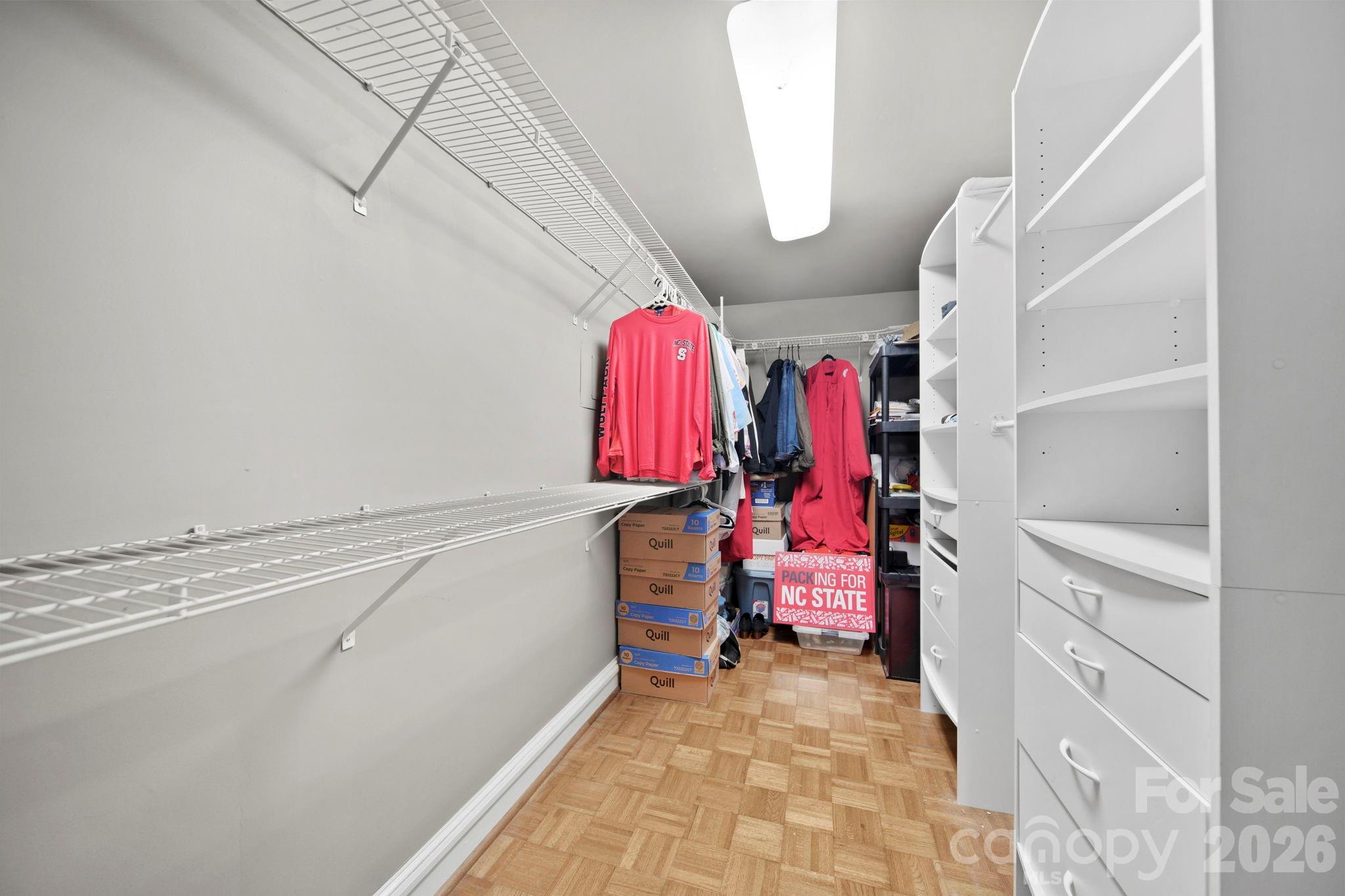 1109 Union Road Gastonia, NC 28054 - Photo 39 of 44 a view of walk in closet with clothes and shoes