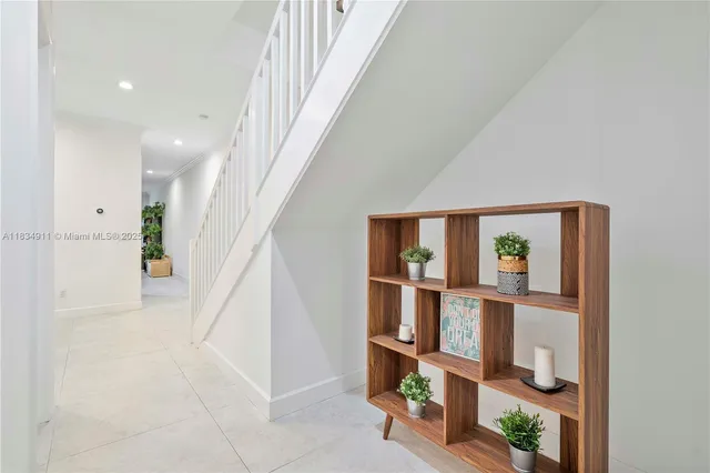 an entryway with a workspace