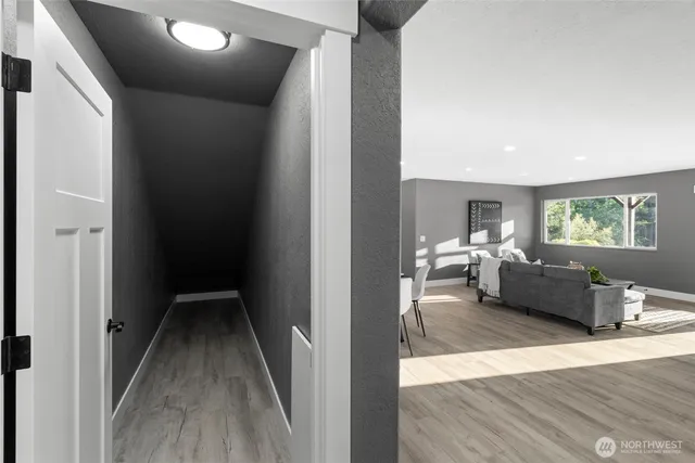 a bathroom with double sink and a mirror