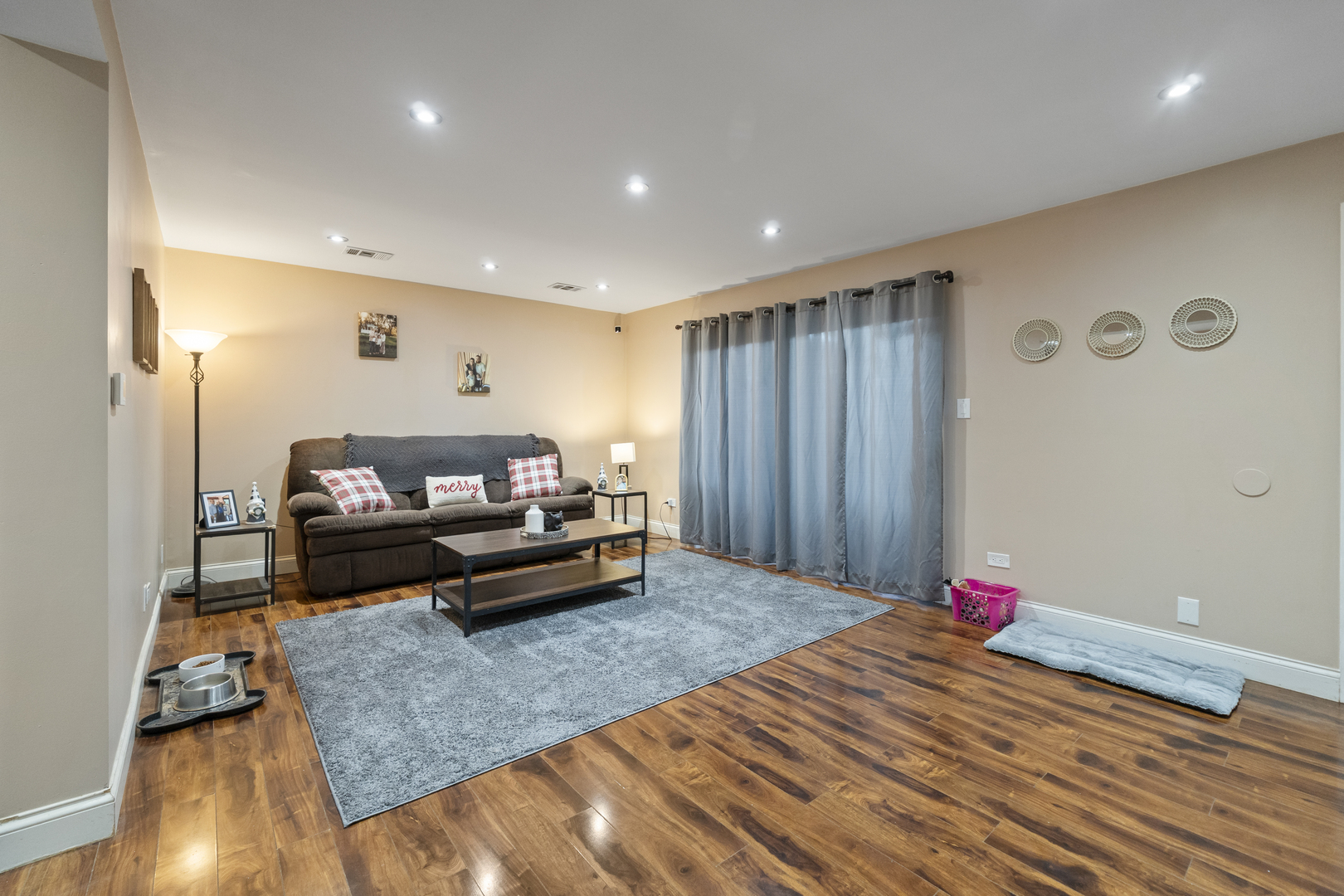 9645 South Harlem Avenue, Unit 1H Chicago Ridge, IL 60415 - Photo 2 of 14 a living room with furniture and a wooden floor