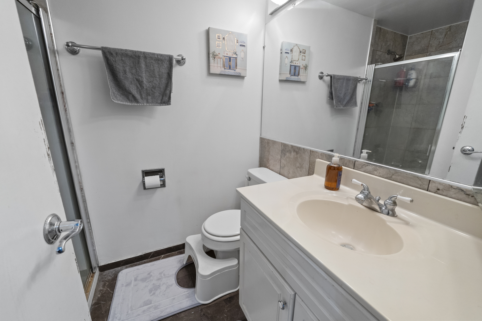 9645 South Harlem Avenue, Unit 1H Chicago Ridge, IL 60415 - Photo 6 of 14 a bathroom with a sink toilet and shower