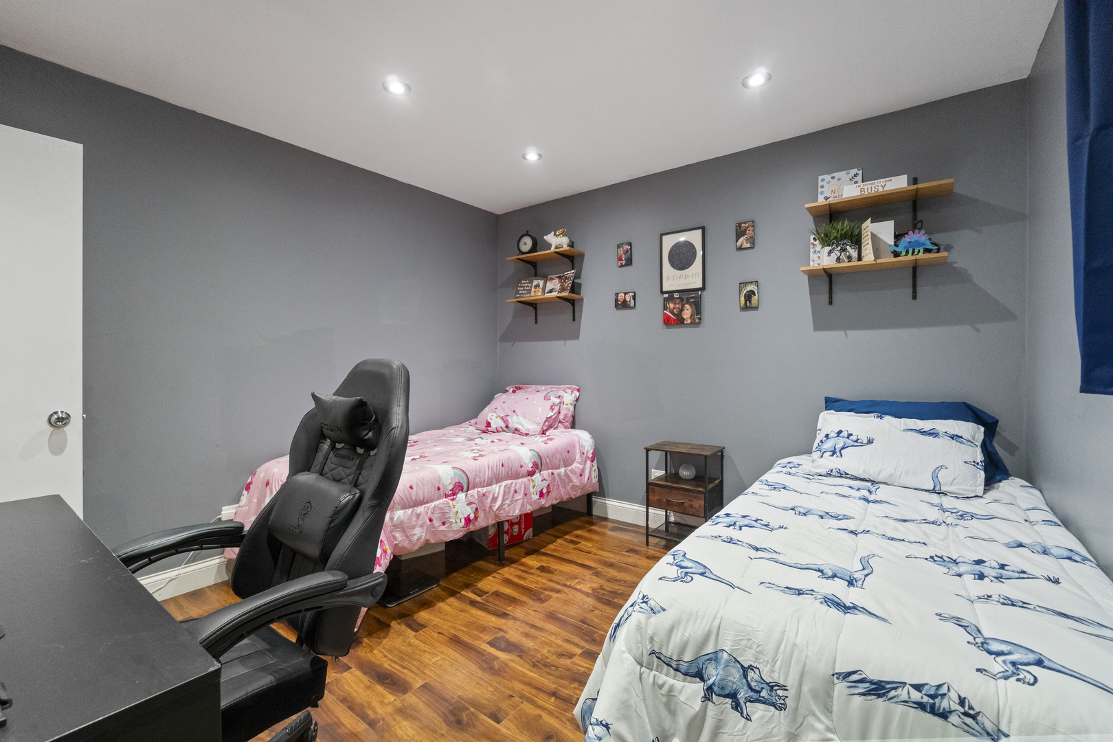 9645 South Harlem Avenue, Unit 1H Chicago Ridge, IL 60415 - Photo 9 of 14 a bedroom with two beds and a desk