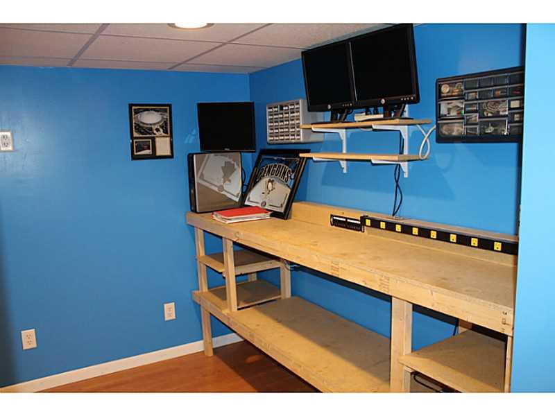 111 Long Road Georgetown, PA 15043 - Photo 18 of 25 Den. Check out the office/den workspace with shelving galore. Wired up for cable/internet - all of your needs.