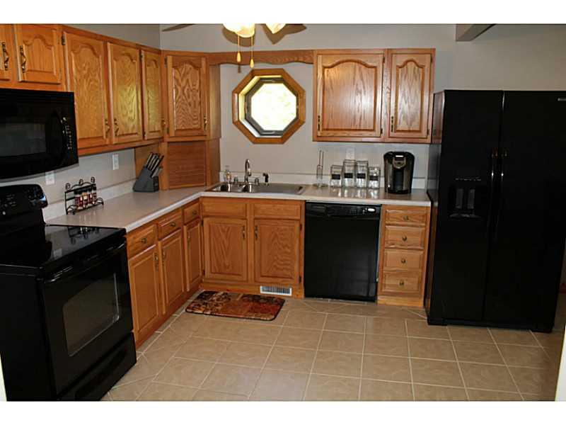 111 Long Road Georgetown, PA 15043 - Photo 6 of 25 Kitchen. Well designed kitchen with updated appliances and flooring. Easy care and functional for all your families needs.