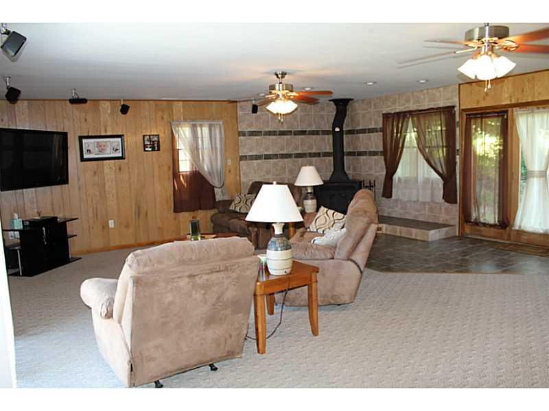 111 Long Road Georgetown, PA 15043 - Photo 9 of 25 Living Room. WHAT!!! This space is 28x22. Enjoy the comfort of family living and entertaining in a space that accommodates all functions.
