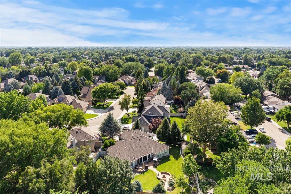 5184 North Greyloch Way Boise, ID 83704 - Photo 31 of 32 Expansive aerial showcasing a residential area with mature tree coverage