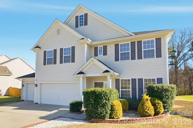 a front view of house with a yard