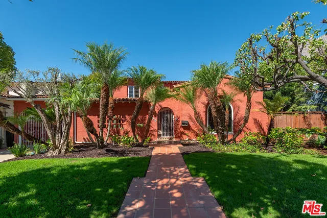 a view of a park with palm trees
