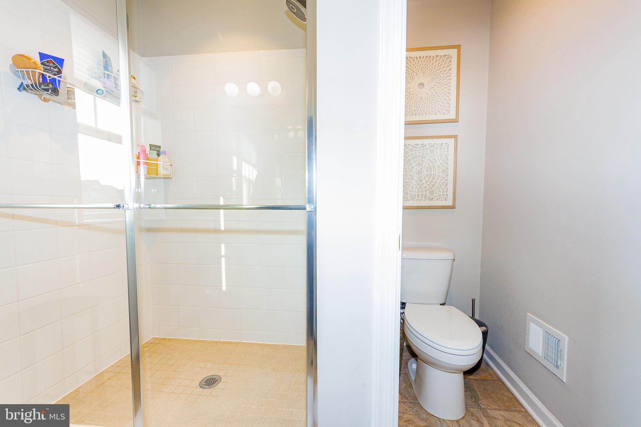 16201 Coolidge Avenue Silver Spring, MD 20906 - Photo 23 of 40 Primary shower w/ glass doors