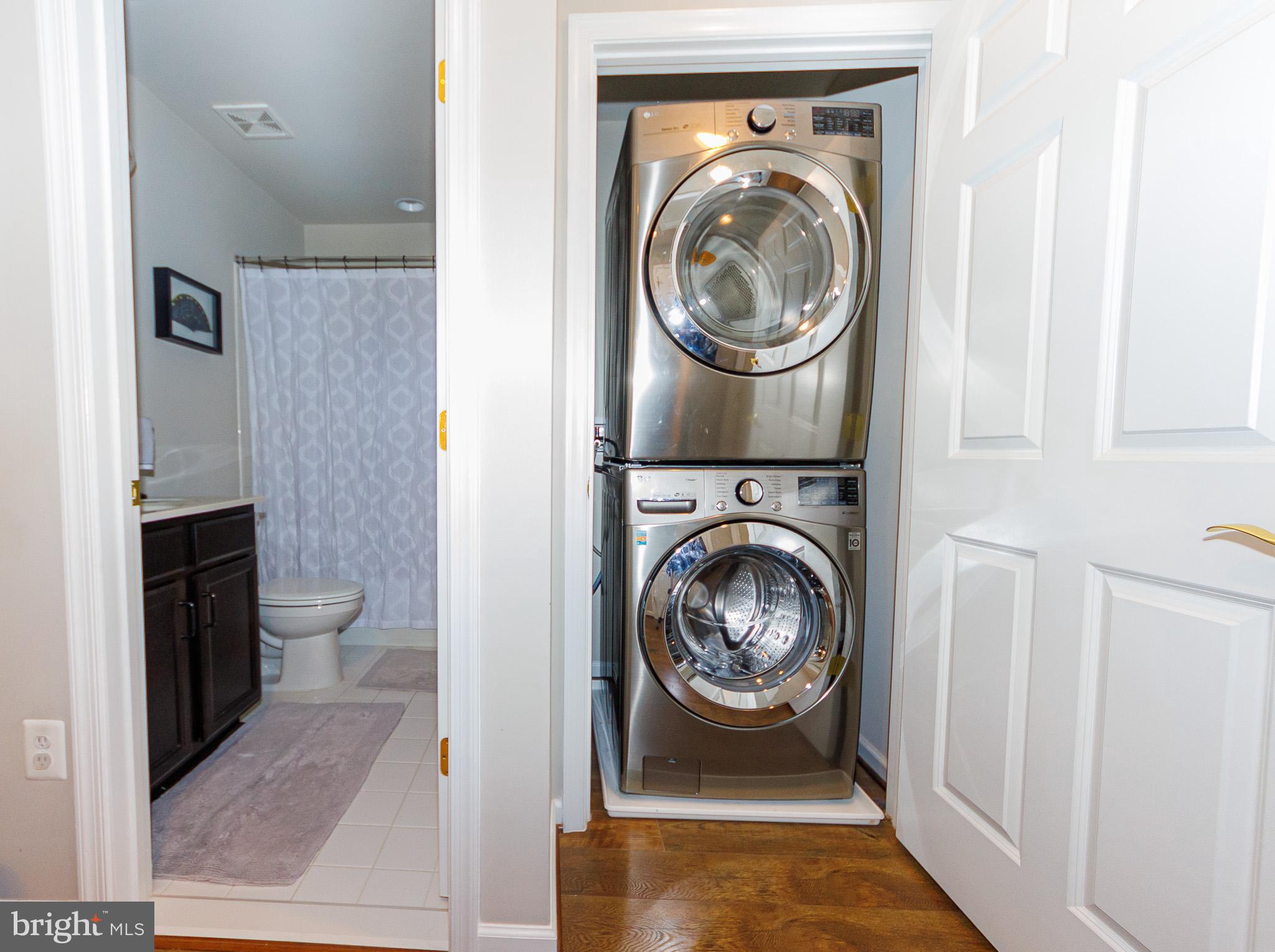 16201 Coolidge Avenue Silver Spring, MD 20906 - Photo 24 of 40 Upstairs hall washer & dryer