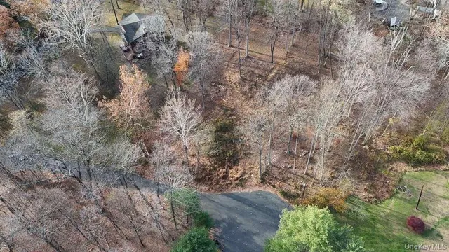 a picture of a room with a white wall and door