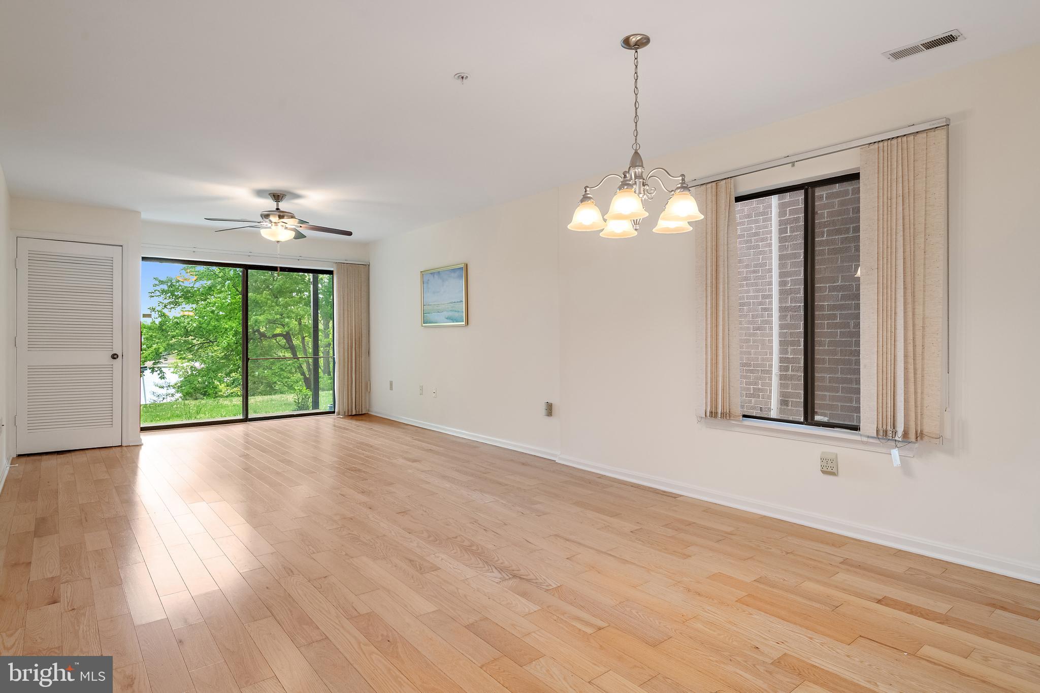 2900 Shipmaster Way, Unit 120 Annapolis, MD 21401 - Photo 10 of 45 Large living/dining area full of light