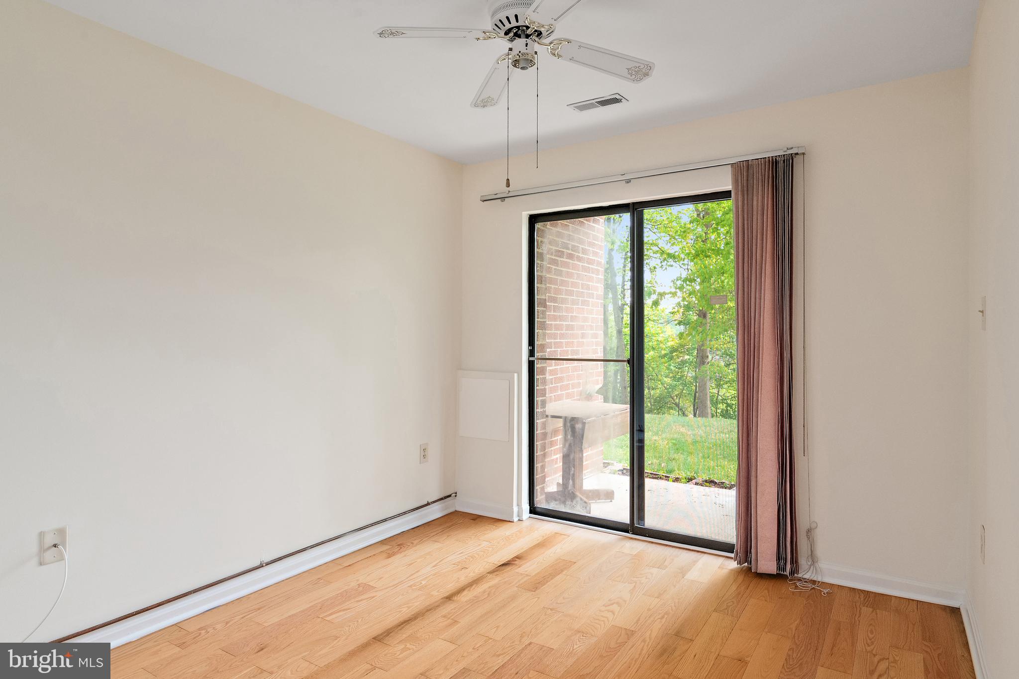 2900 Shipmaster Way, Unit 120 Annapolis, MD 21401 - Photo 22 of 45 2nd bedroom sliding glass door