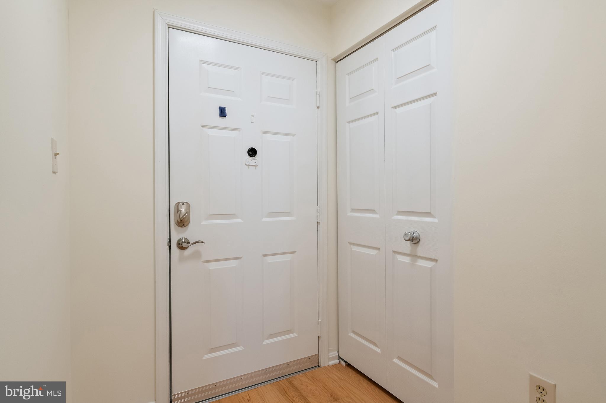 2900 Shipmaster Way, Unit 120 Annapolis, MD 21401 - Photo 26 of 45 Front door and coat closet