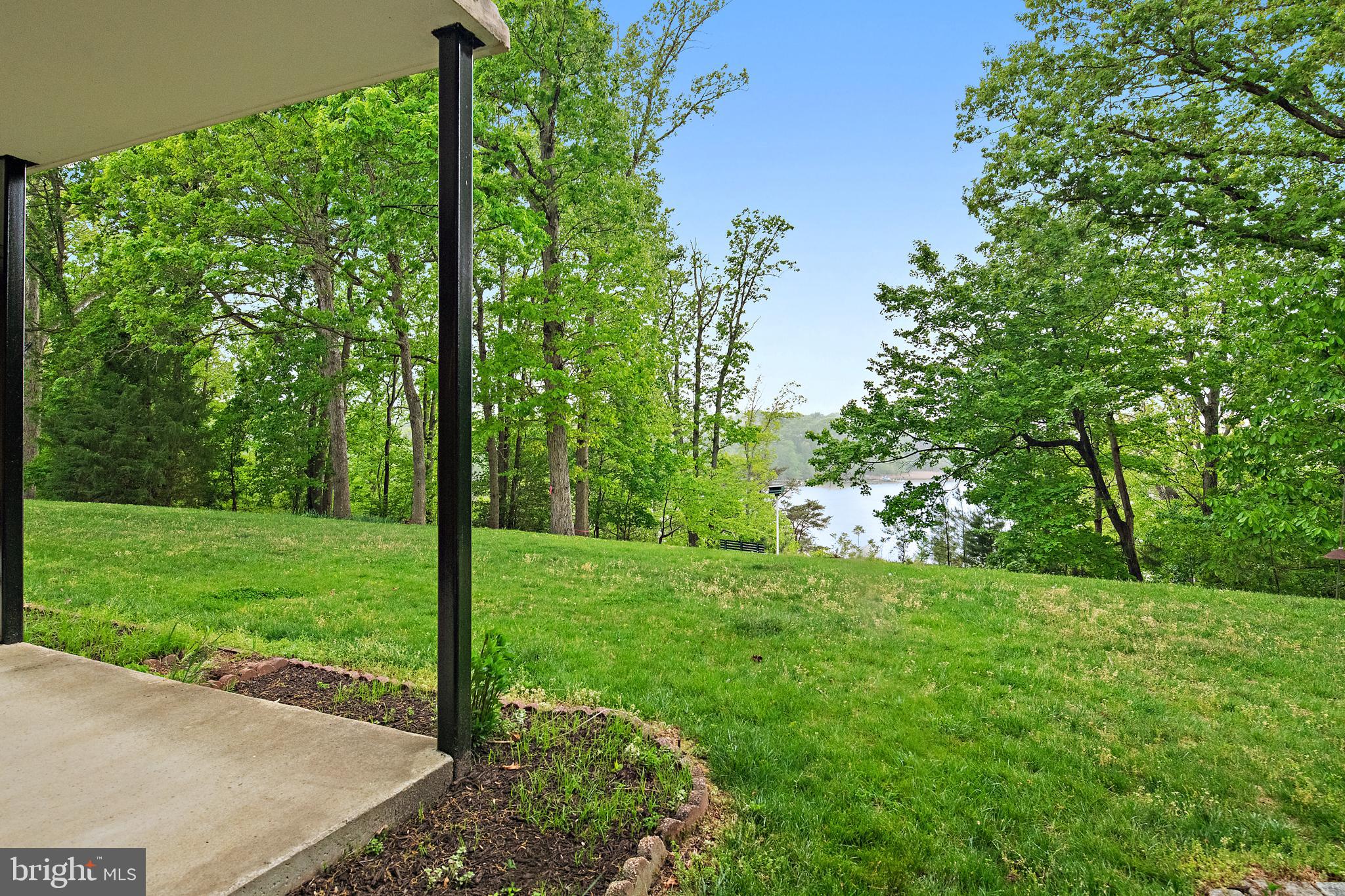 2900 Shipmaster Way, Unit 120 Annapolis, MD 21401 - Photo 9 of 45 Side yard showing deck and view