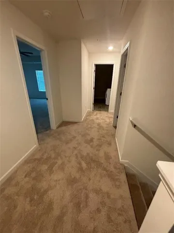 an empty room with a empty space and window