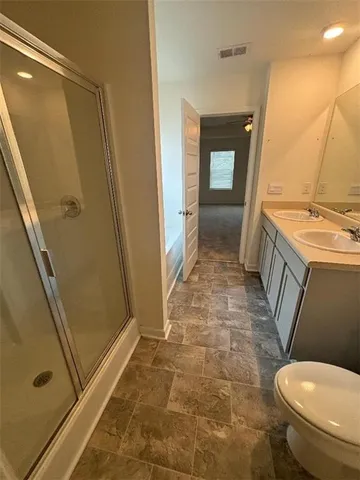 a utility room with a sink a washer and dryer