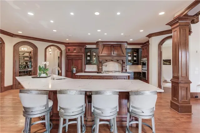 a bedroom with furniture and a wooden floor