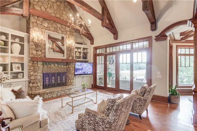 a view of a balcony with wooden floor