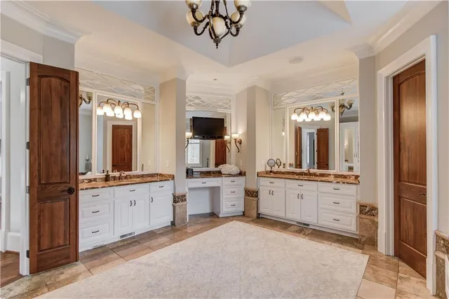 a kitchen with stainless steel appliances granite countertop a stove and a refrigerator