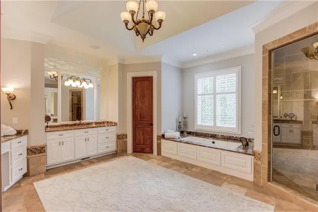 a view of a kitchen center island and windows