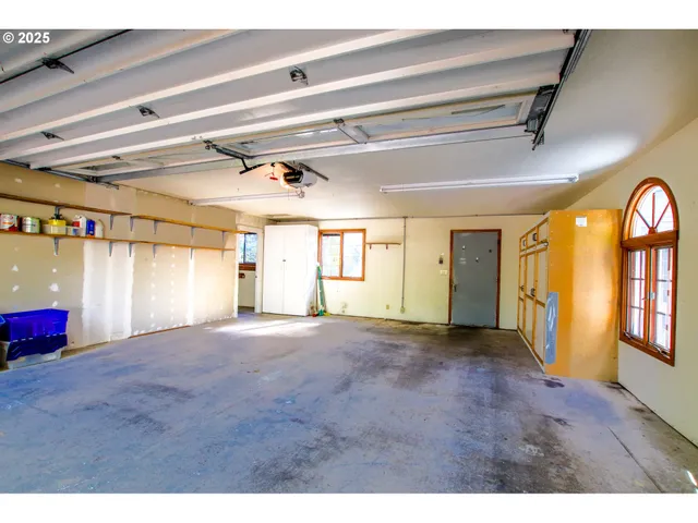 a view of empty room with windows