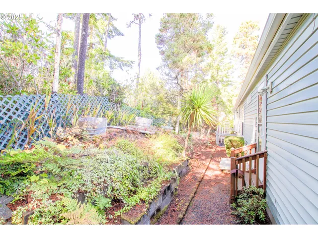 a view of yard with patio