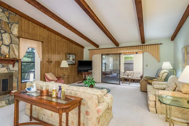 a living room with furniture and a table