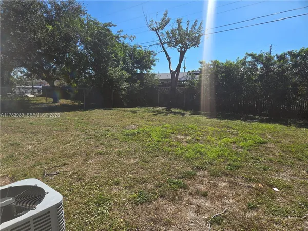 a view of outdoor space and yard