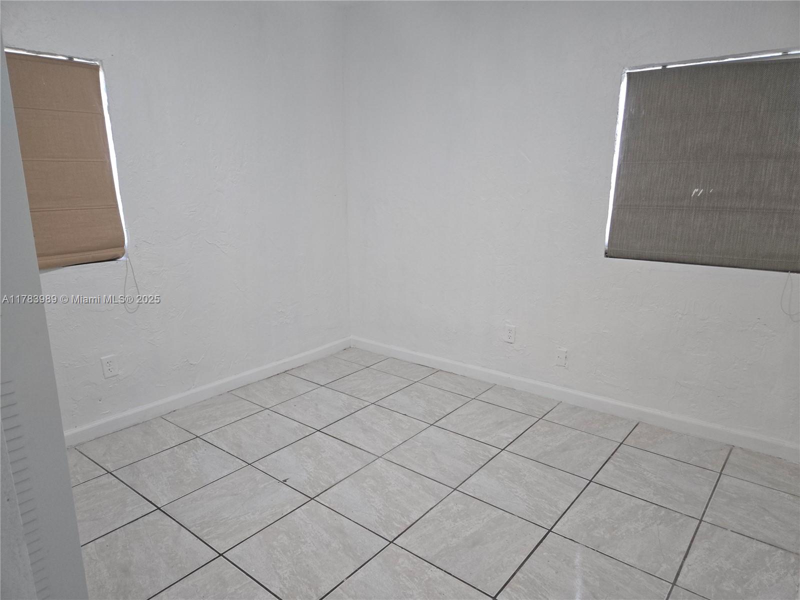 3310 Northwest 214th Street Miami Gardens, FL 33056 - Photo 5 of 17 a view of a utility room