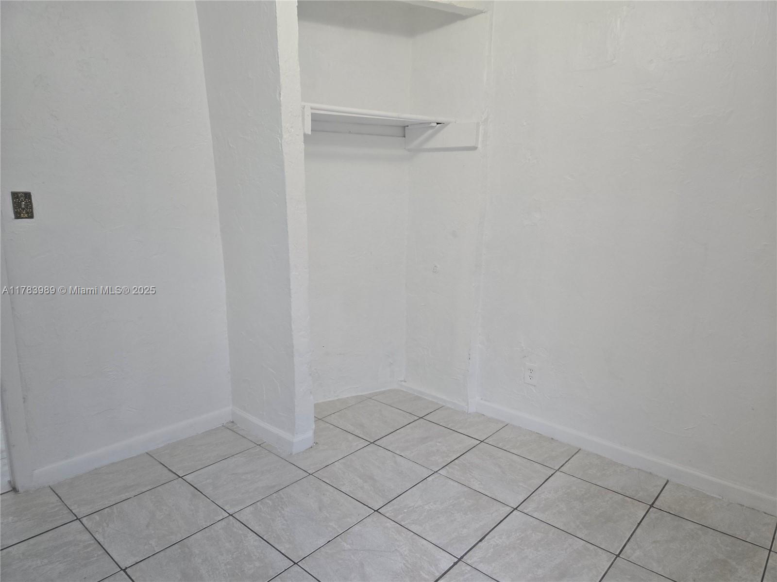 3310 Northwest 214th Street Miami Gardens, FL 33056 - Photo 6 of 17 a view of room