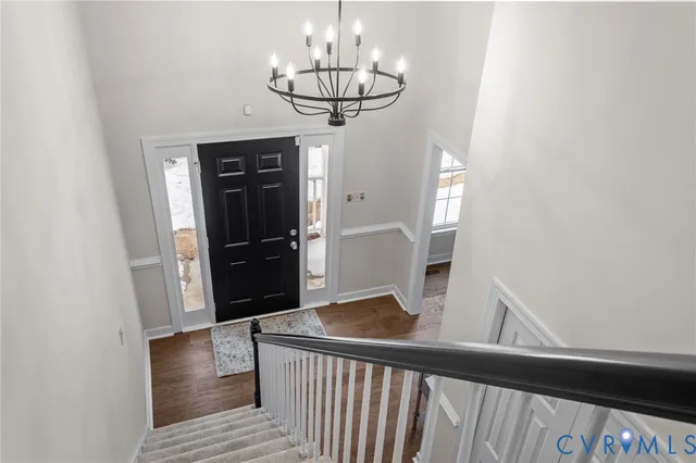 a bathroom with a toilet sink and shower