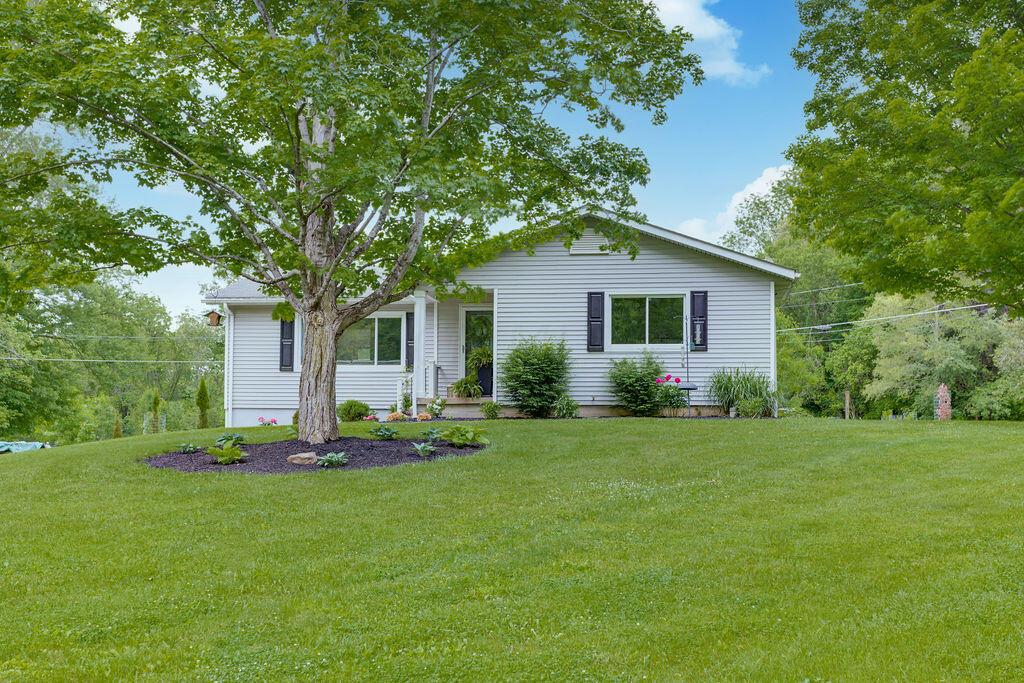 4065 Harlem Road Galena, OH 43021 - Photo 64 of 64 Front of home with lots of mature trees