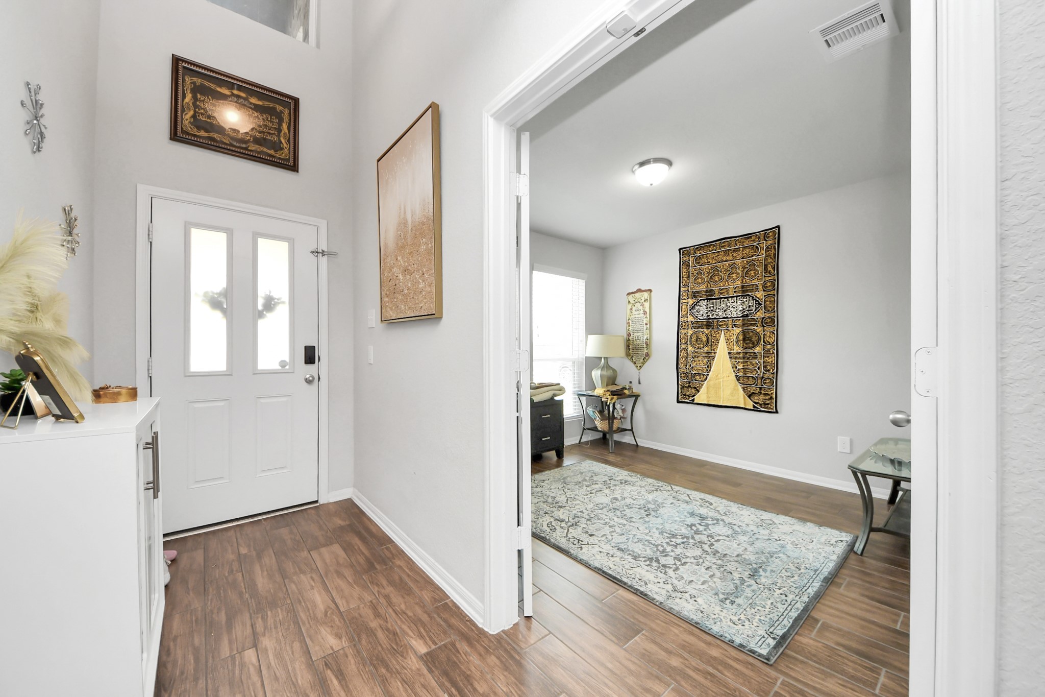 2643 Ridgeback Drive Rosenberg, TX 77471 - Photo 6 of 46 a view of livingroom with hardwood floor and a window