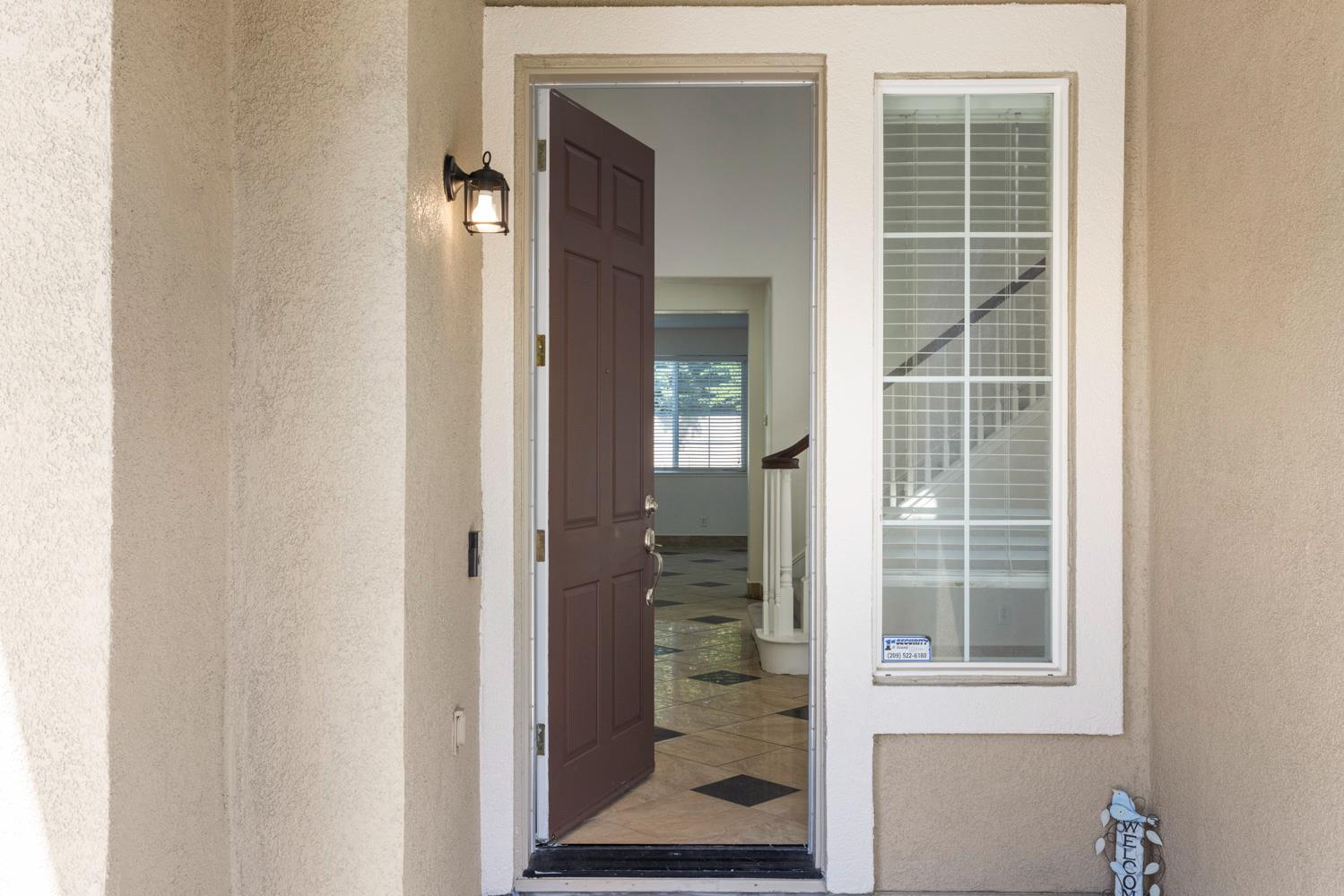 3105 Ripple Court Modesto, CA 95355 - Photo 4 of 46 a view of a door and a front door