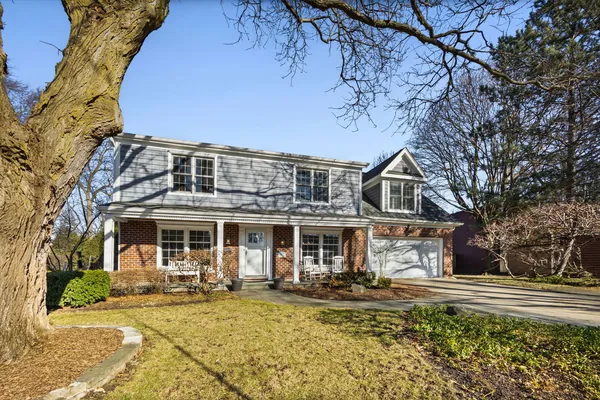a front view of a house with swimming pool