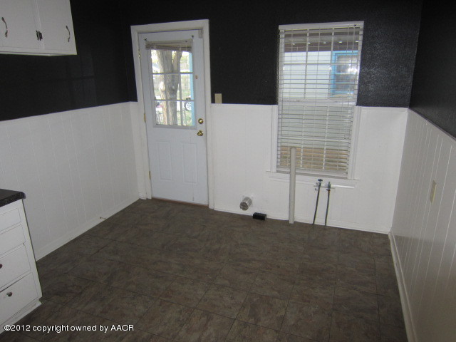 4114 Parker Street Amarillo, TX 79110 - Photo 10 of 15 an empty room with windows