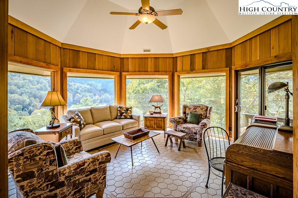 233 Balsam Road Boone, NC 28607 - Photo 12 of 50 a living room with furniture and a large window