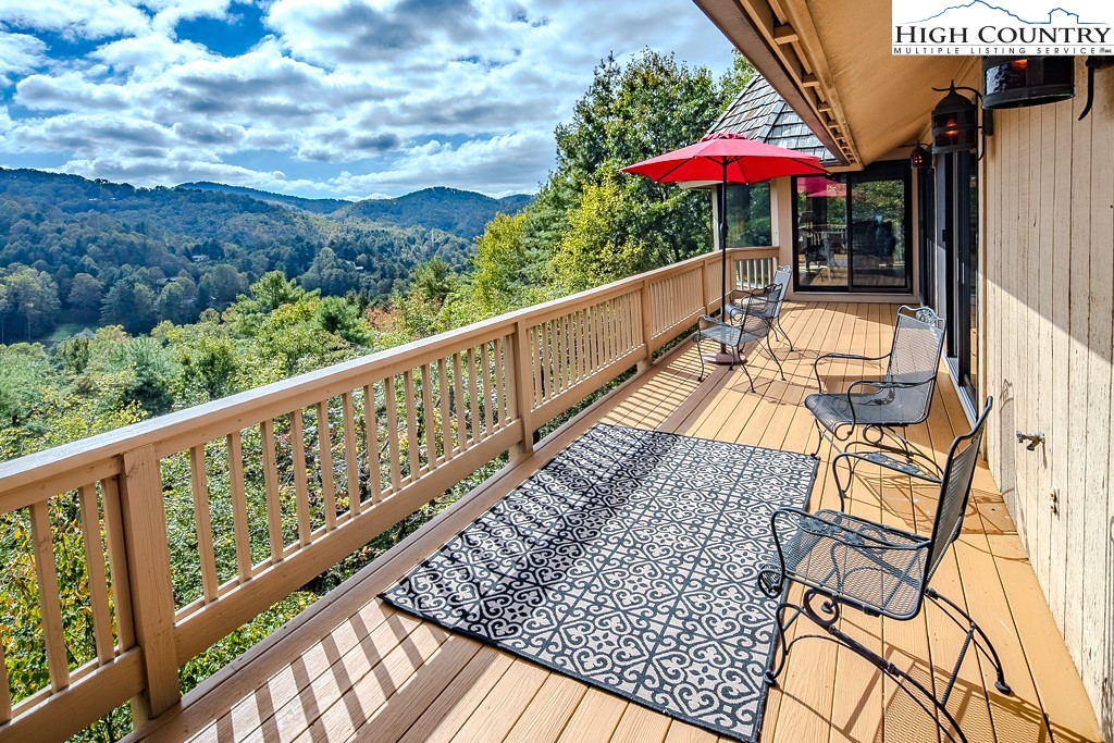233 Balsam Road Boone, NC 28607 - Photo 18 of 50 a view of a balcony with wooden floor