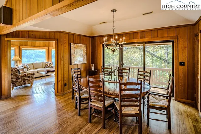 a kitchen with stainless steel appliances a refrigerator sink and cabinets