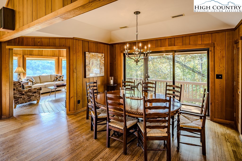 233 Balsam Road Boone, NC 28607 - Photo 21 of 50 a dining room with furniture window wooden floor