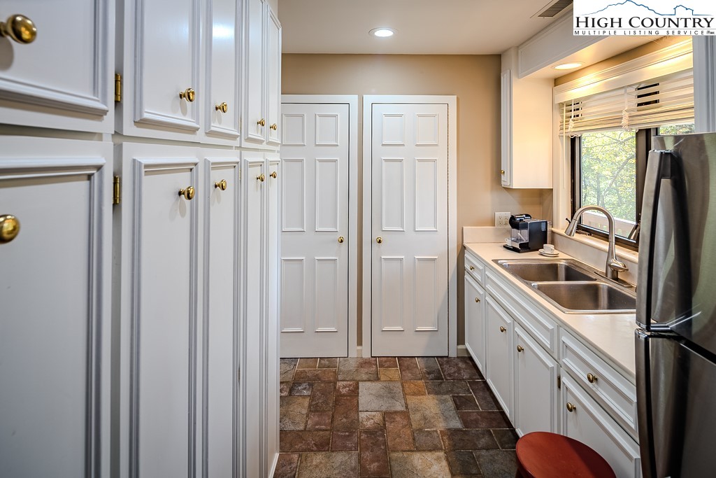 233 Balsam Road Boone, NC 28607 - Photo 26 of 50 a bathroom with a sink a mirror and a shower