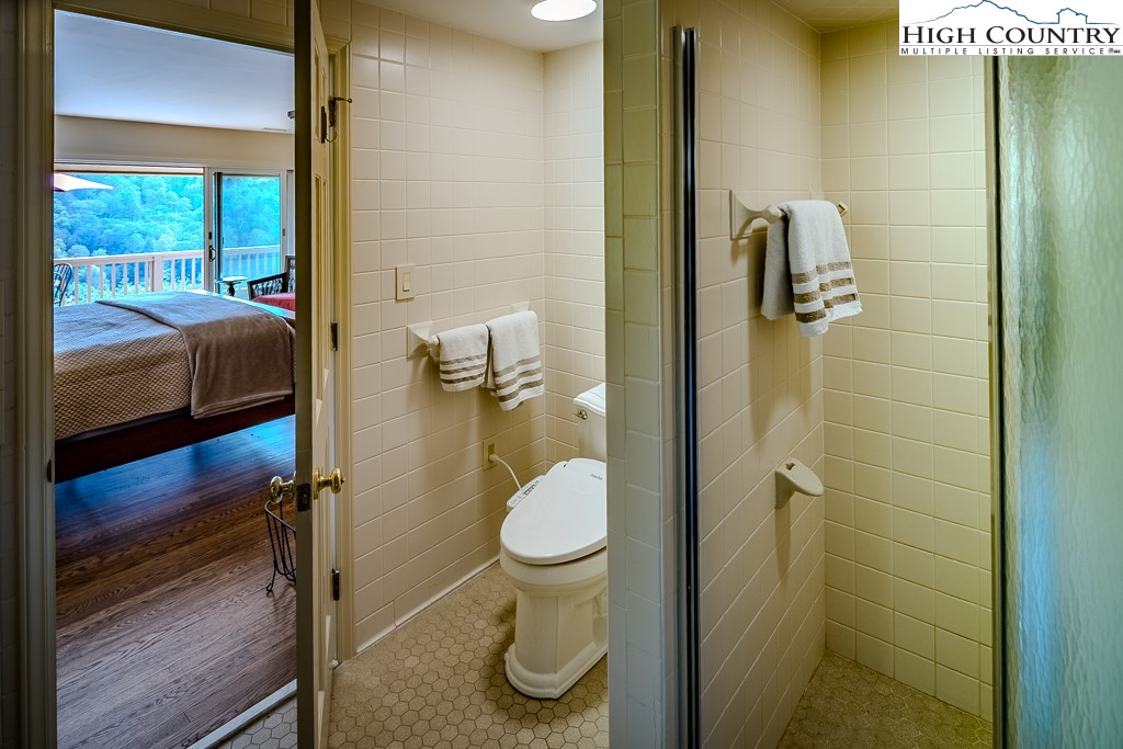 233 Balsam Road Boone, NC 28607 - Photo 30 of 50 a bathroom with a toilet and a shower