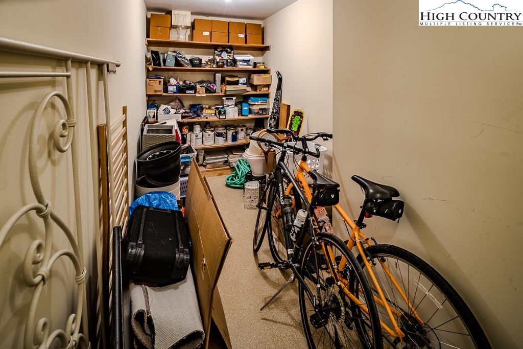 233 Balsam Road Boone, NC 28607 - Photo 40 of 50 a view of walk in closet with clothes and shoes