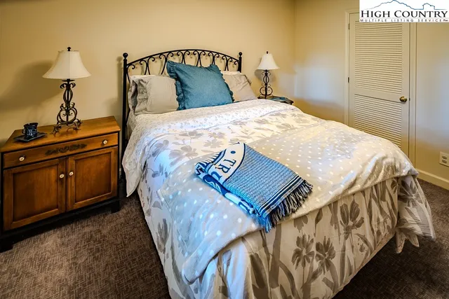 a bathroom with a sink toilet and window