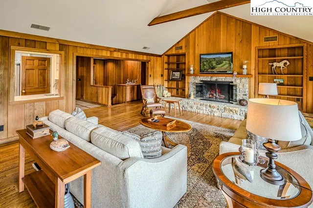 a very nice looking living room with a large window