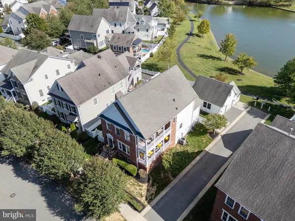 an aerial view of a house with a ocean view