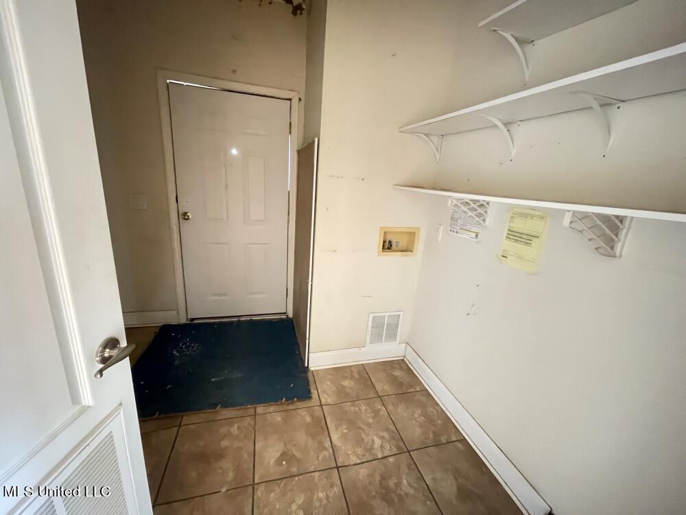 1514 Ellis Street Pass Christian, MS 39571 - Photo 9 of 15 Laundry