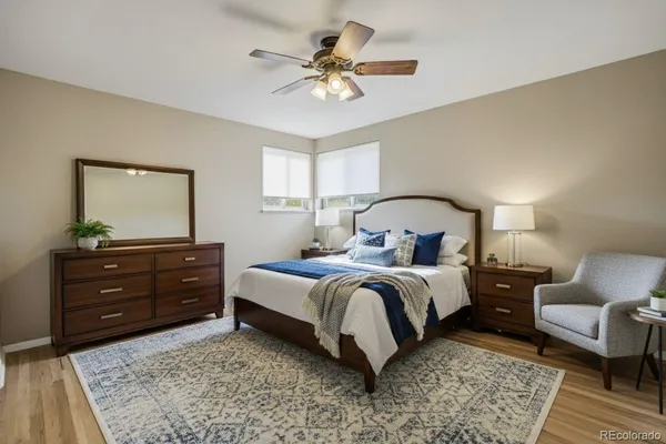a bedroom with a bed and a dresser